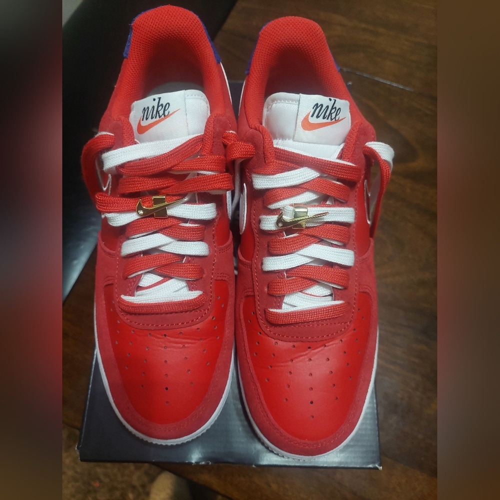 Nike Air Force Red and White Sneakers with Gold Accents